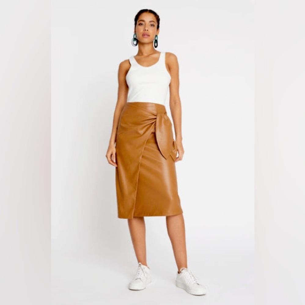 Choosy pleather skirt with tie front and zippered back.